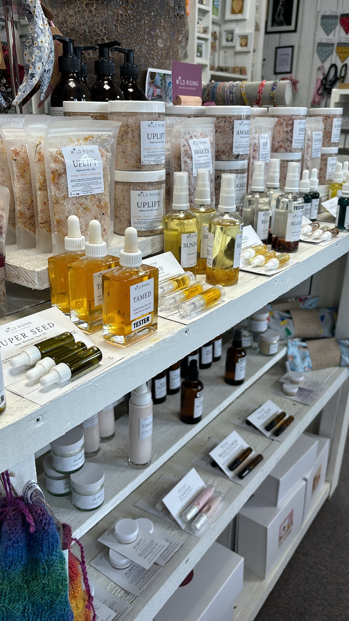 Shelf displaying various skincare products in a store setting