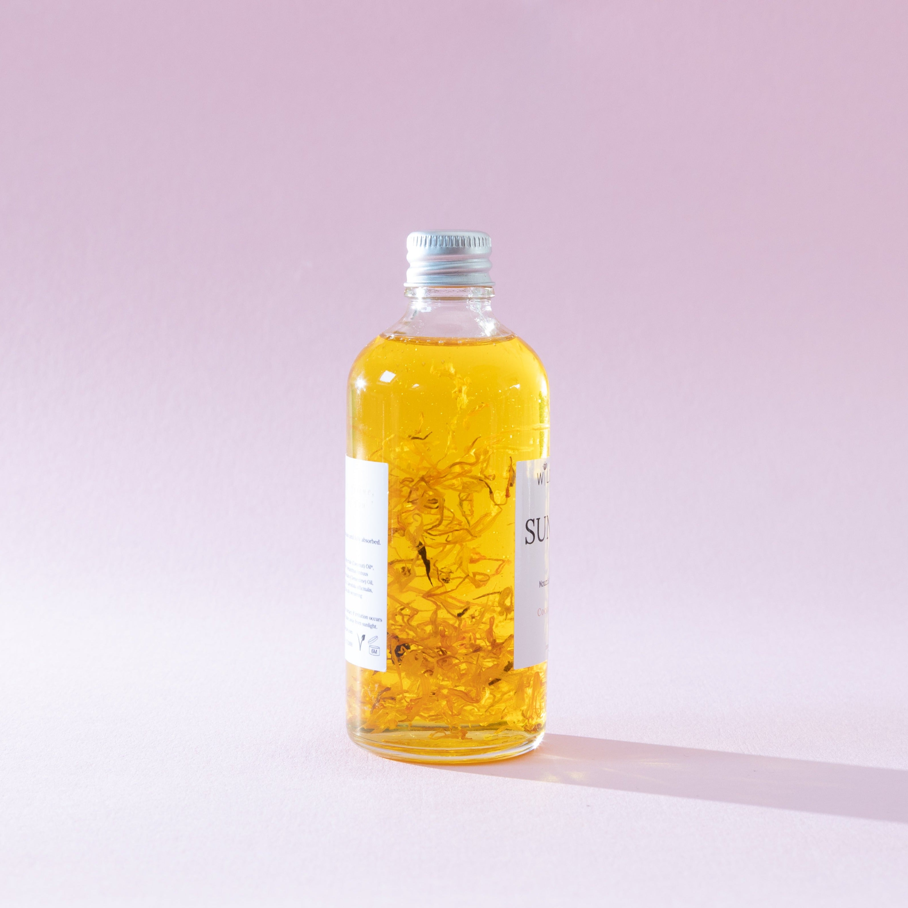 side angle of sundaze body oil refill