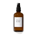 amber 100ml bottle with organic rose water in