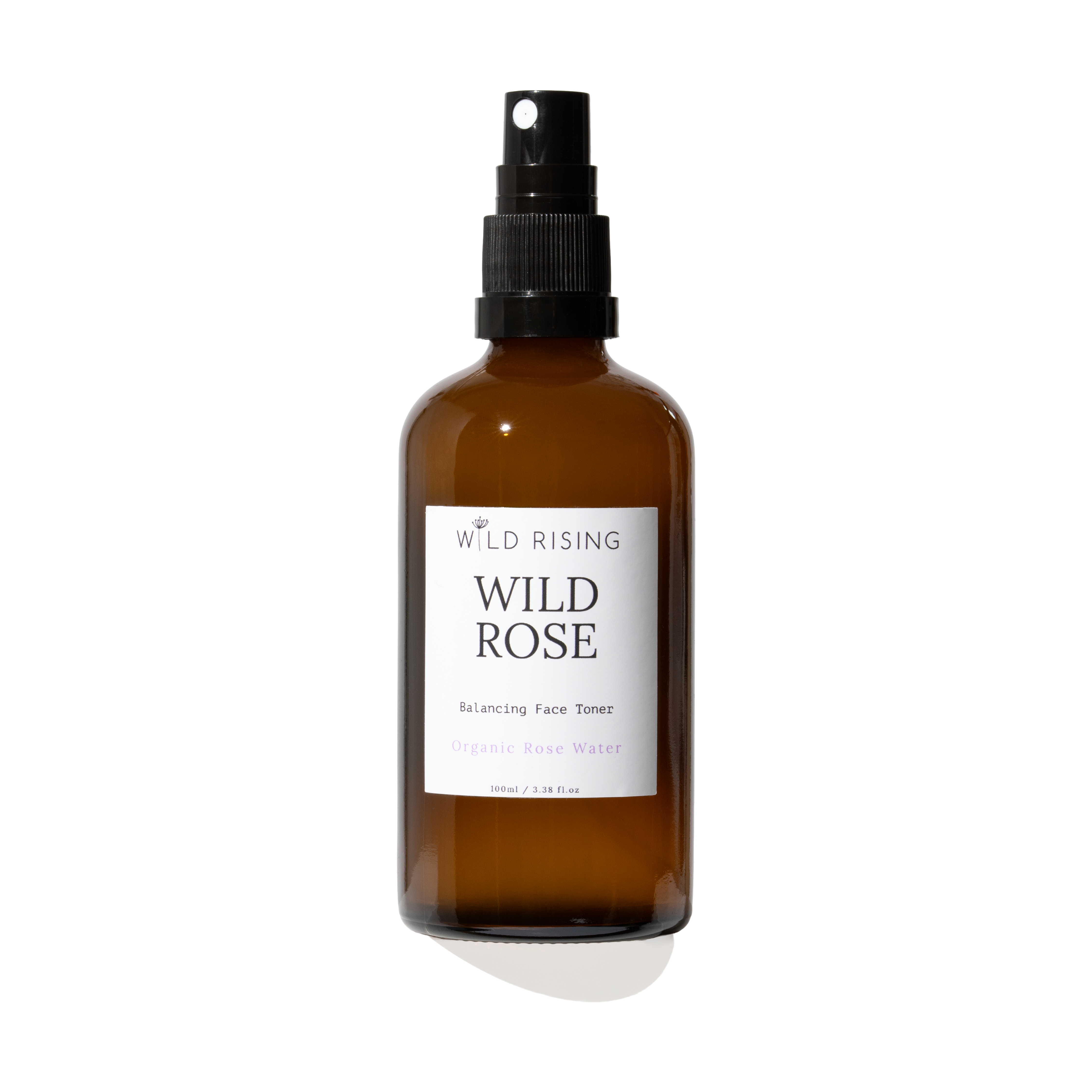amber 100ml bottle with organic rose water in