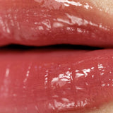 close of a lip showing texture of a lip oil