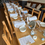 long wooden table set up for a skincare event