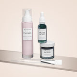 Three skincare products from Wild Rising on a beige surface with a light background