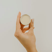 hand holding a lip balm
