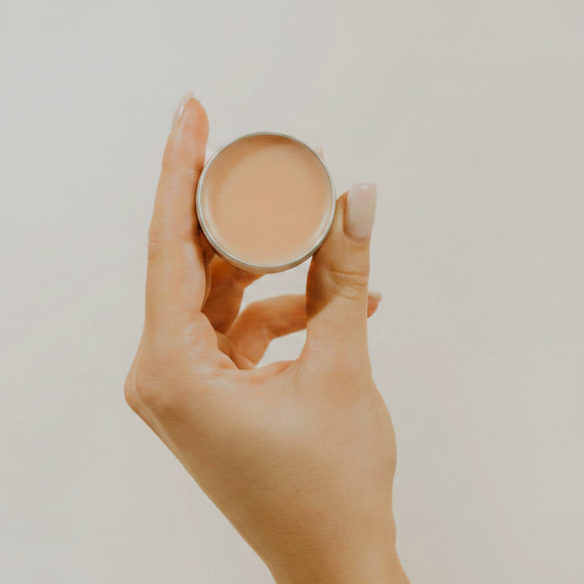 hand holding a lip balm