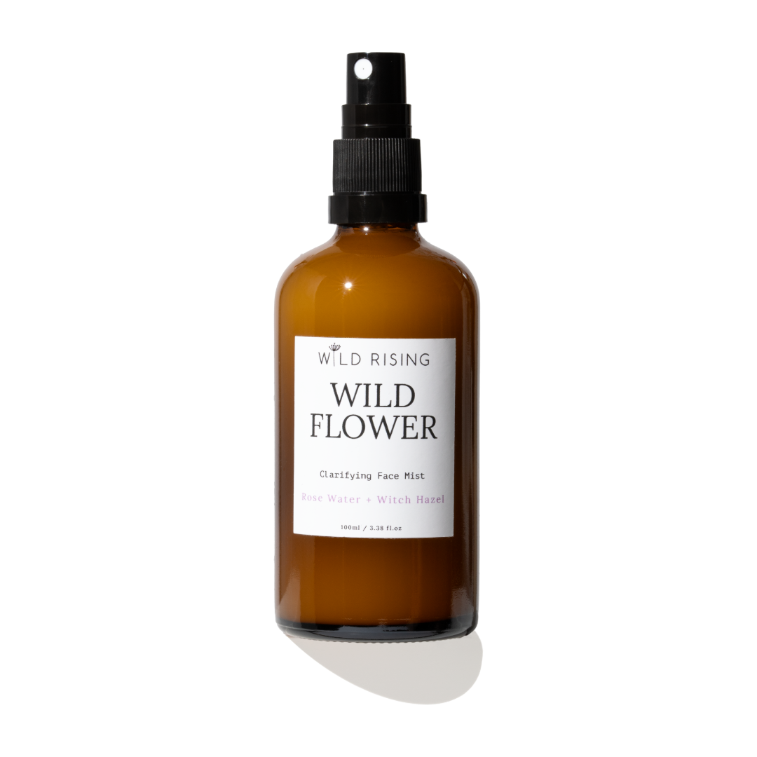 amber bottle of rose water and witch hazel