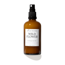 amber bottle of rose water and witch hazel