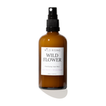 amber bottle of rose water and witch hazel