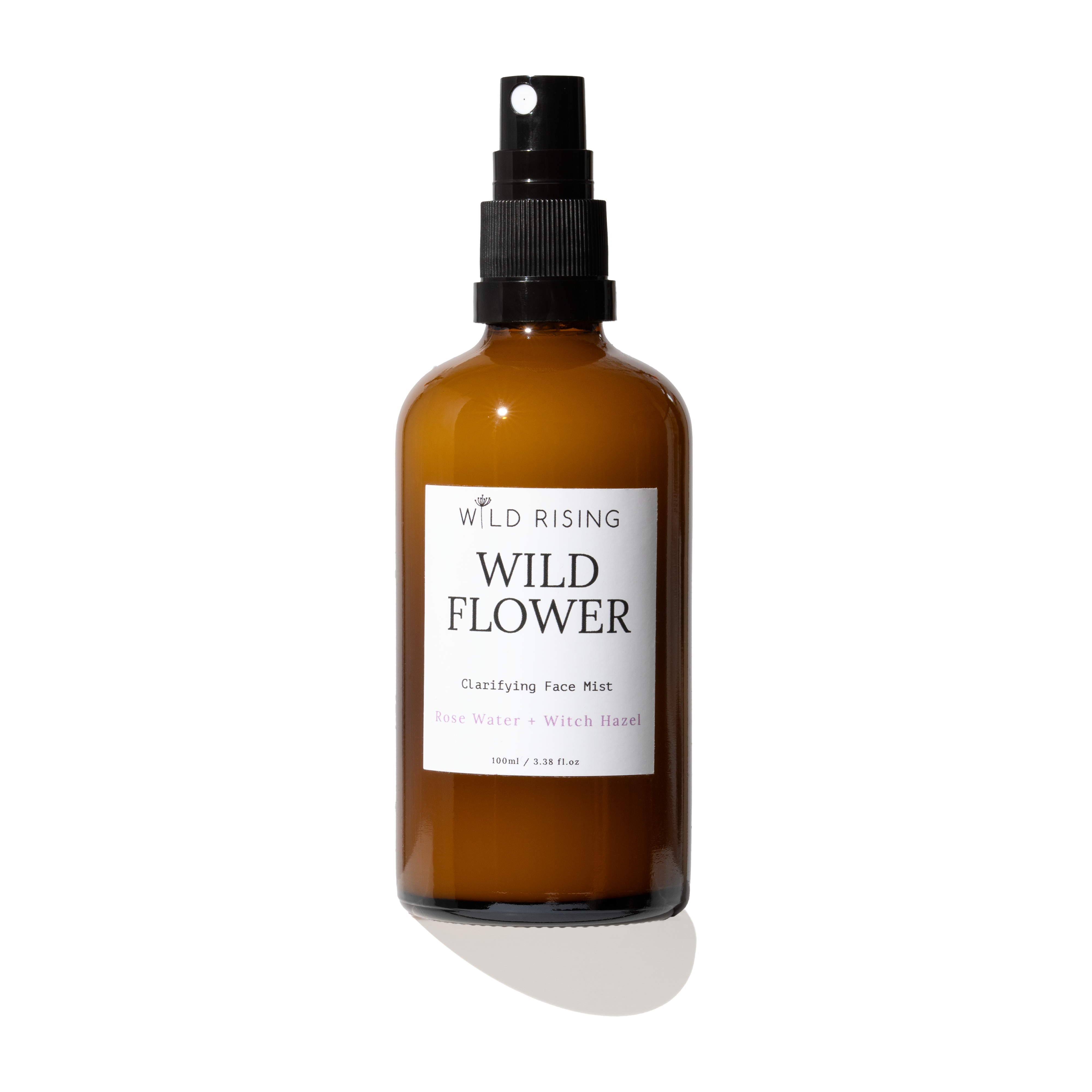 amber bottle of rose water and witch hazel