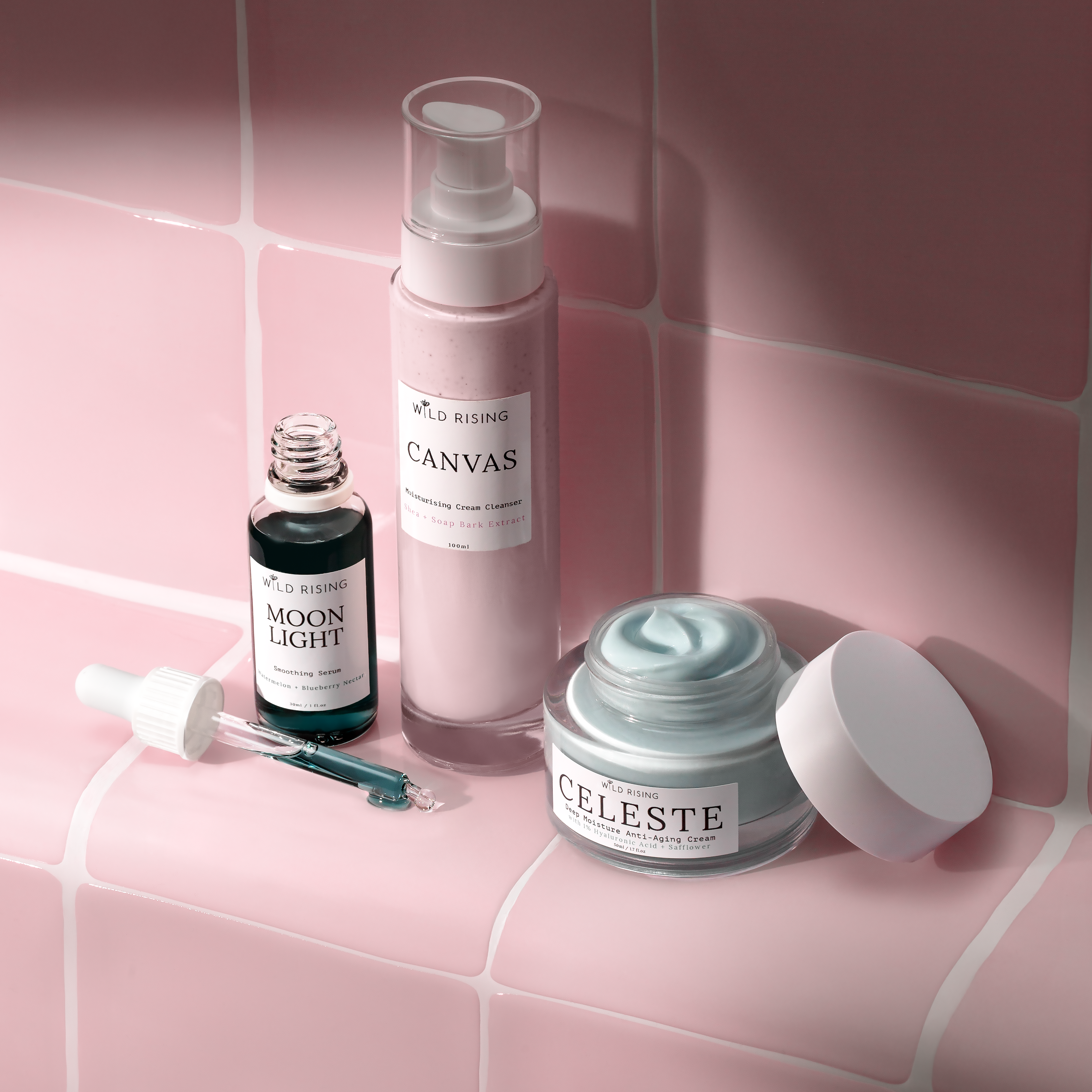 wild rising products on the pink tiled background