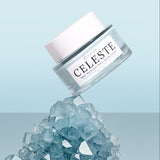 Celeste jar with blue crystals on a light blue background
