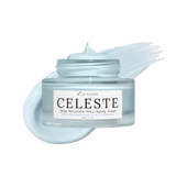 A clear cosmetic jar of Wild Rising Celeste Deep Moisture Anti-Aging Cream with a white label, shown with a pale icy blue cream smear behind it on a white background.