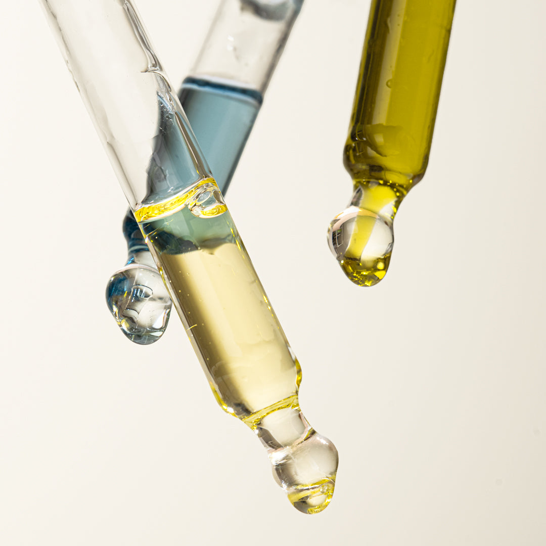 wild rising natural skincare face oils pipette close up