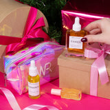 christmas beauty gift set with holographic cosmetic bag