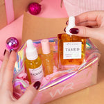 christmas beauty gift set with holographic cosmetic bag
