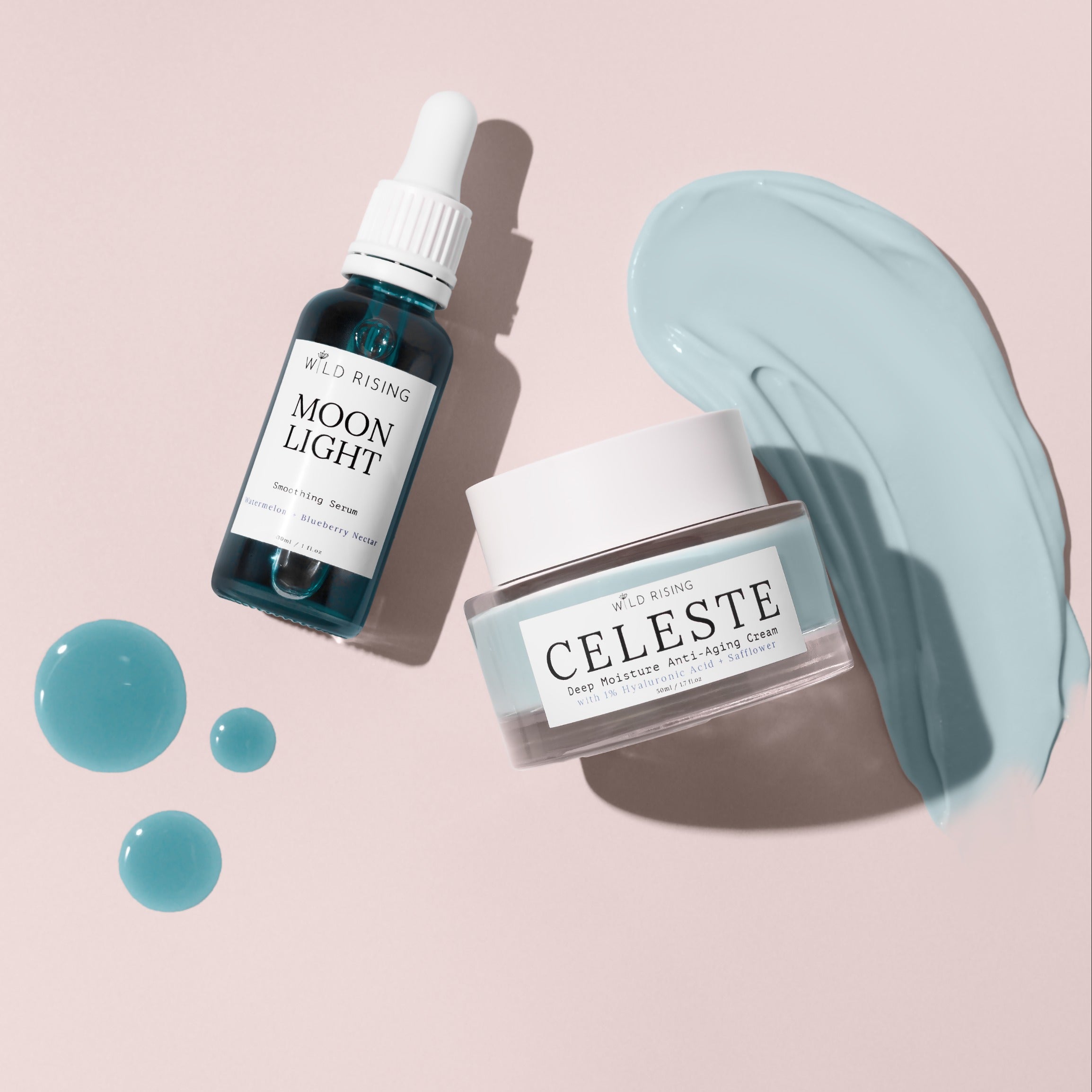 flat lay of a blue cream moisturiser and a blue tansy face oil