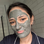 wild rising customer wearing detox activated charcoal mask