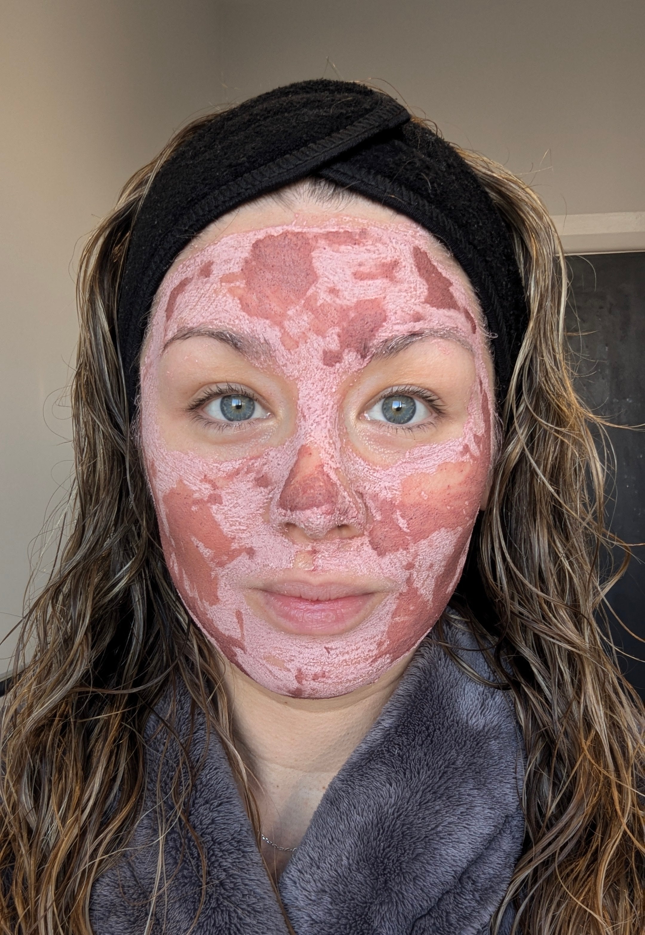 wild rising customer with pink clay mask on her face