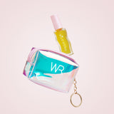 Iridescent coin purse with 'WR' branding and a small bottle on a light pink background