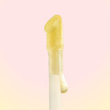 Yellow gel-like substance on a pink background