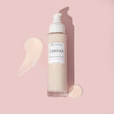 Canvas organic cream cleanser laid flat with smears around it