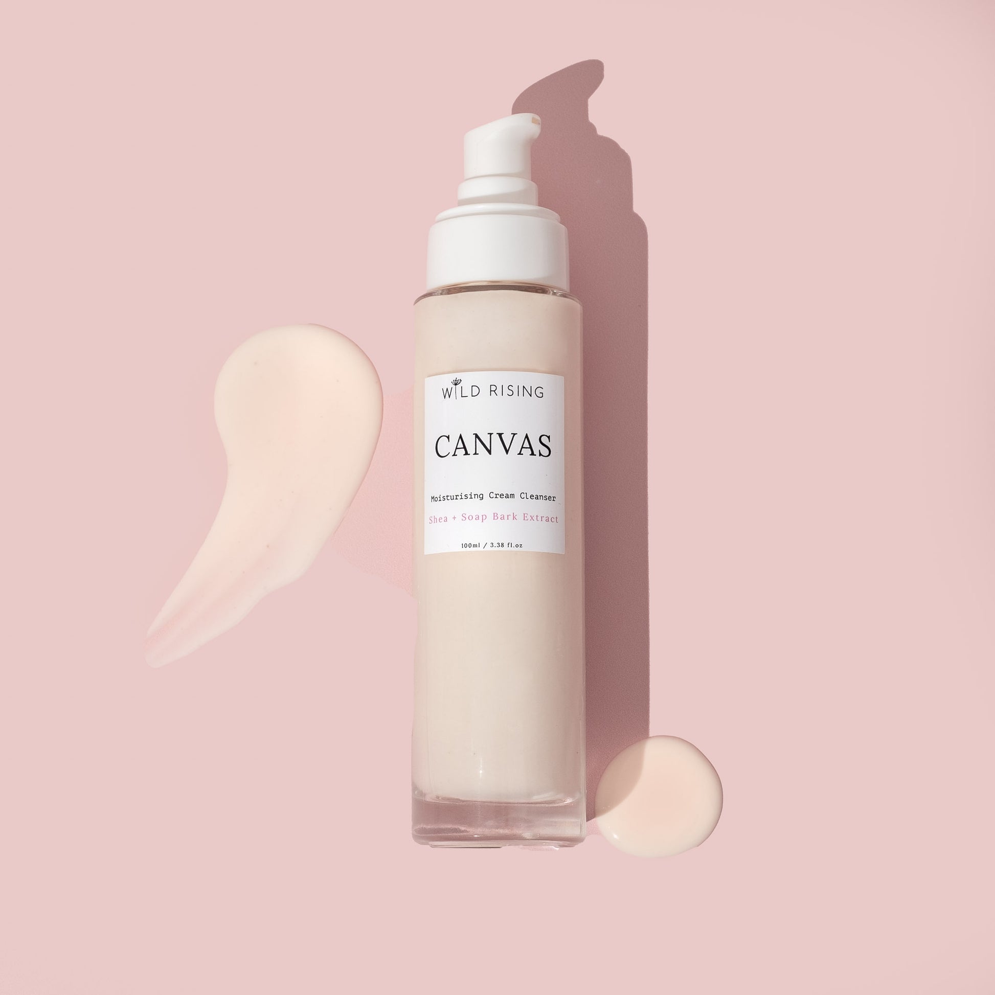 Canvas organic cream cleanser laid flat with smears around it