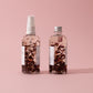bloom body oil refill duo facing away from each other
