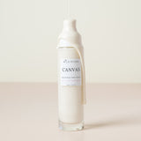 canvas cream cleanser with cream dripping down the bottle