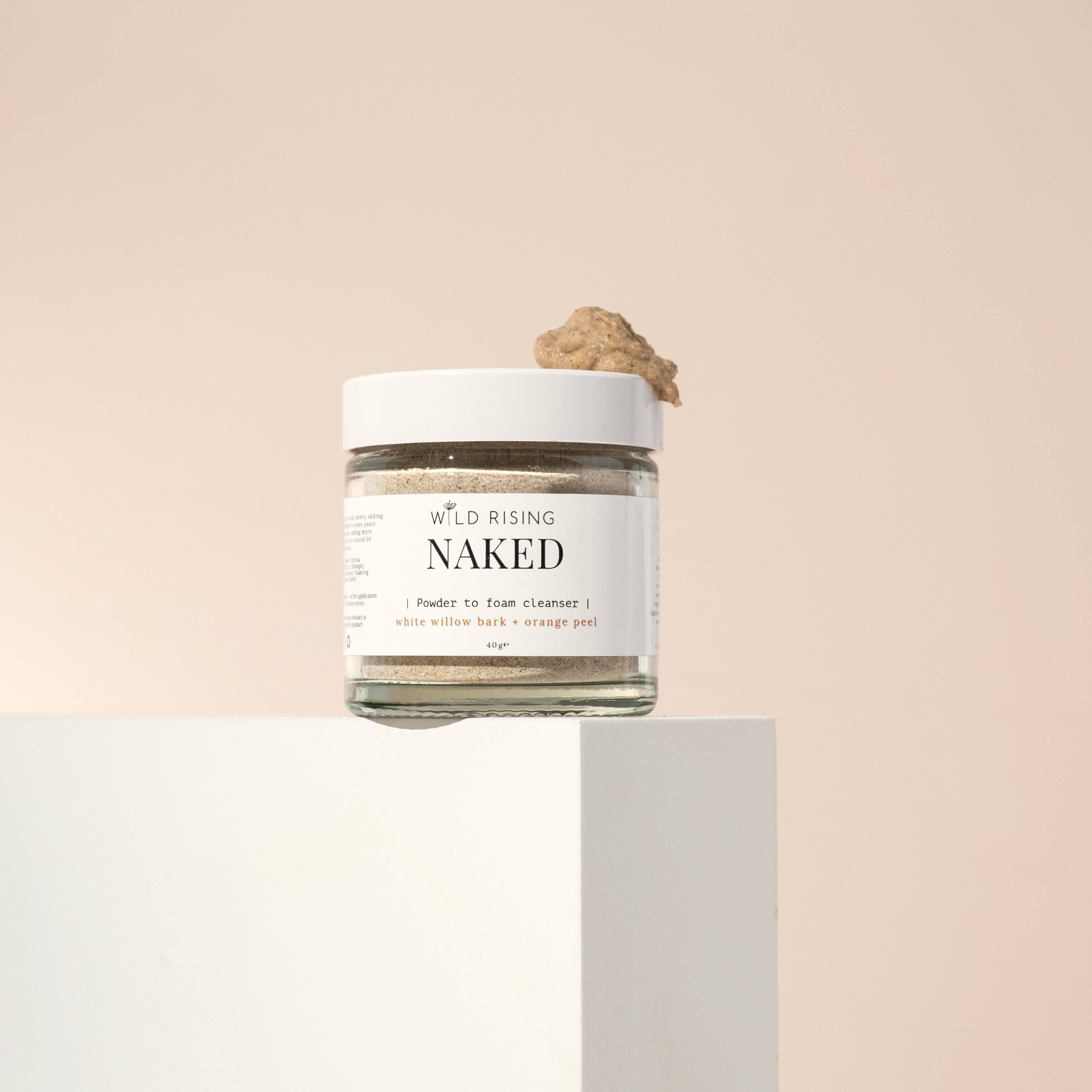 naked powder to foam cleanser on a block with mixture on top