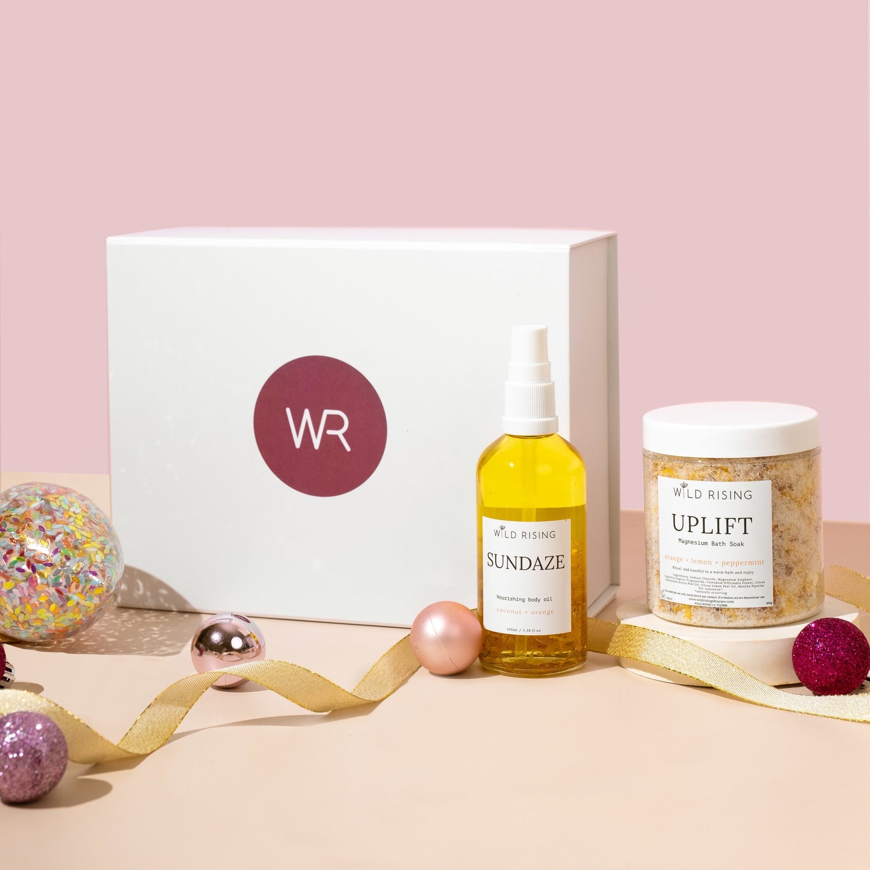christmas gift box with bath salts and body oil 