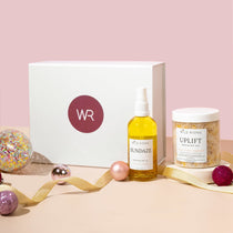 christmas gift box with bath salts and body oil 